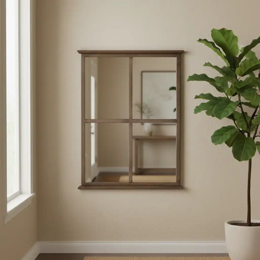 Wooden mirror with glass panels on a beige wall next to a potted plant.