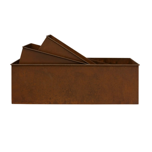 Rust-colored metal planter box on a white background