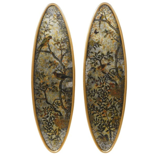 Oval-shaped earrings with nature-themed design on a white background