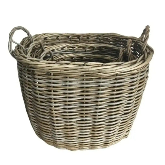 Wicker basket with handles on a white background