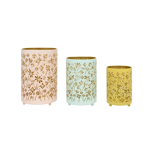 Three decorative vases with floral patterns on a white background