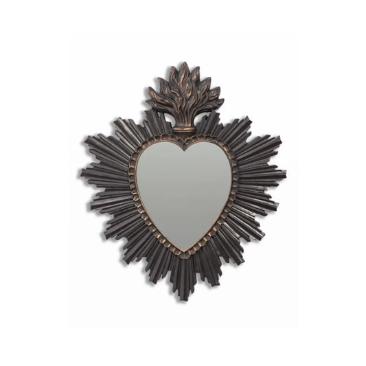 Decorative mirror with heart shape and sunburst frame on a white background