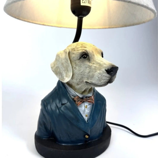 Dog-shaped lamp with a suit and bow tie on a white background