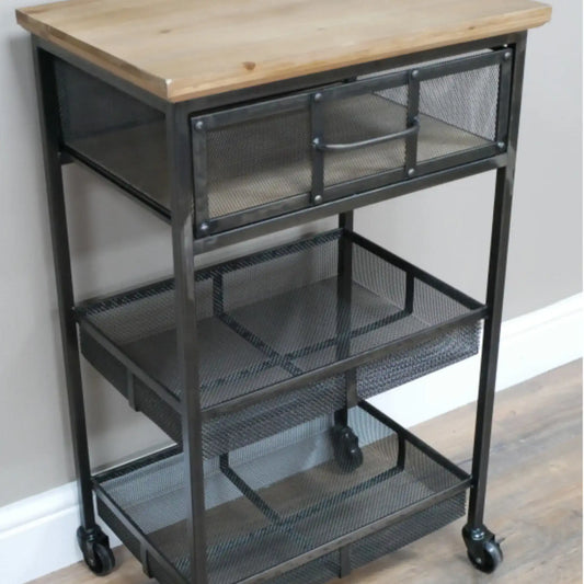 Metal utility cart with wooden top on a wooden floor.