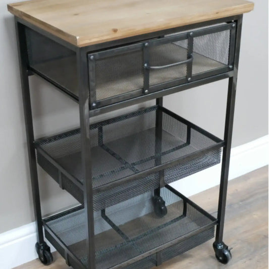 Metal utility cart with wooden top on a wooden floor.