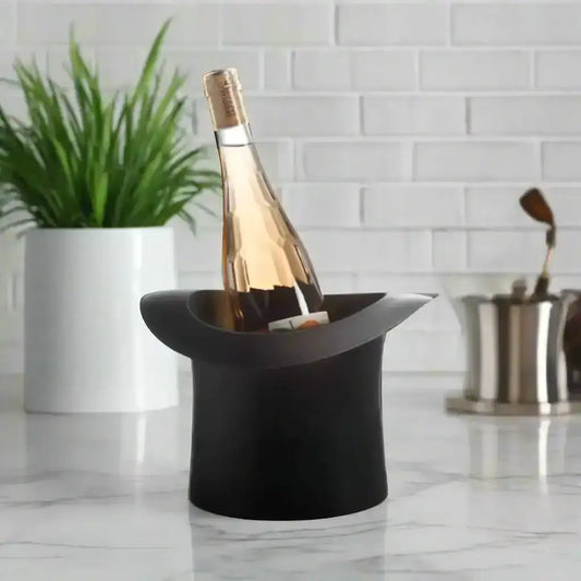 Wine bottle in a black ice bucket on a white background