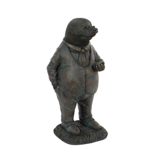 Bronze statue of a mole in formal attire on a white background