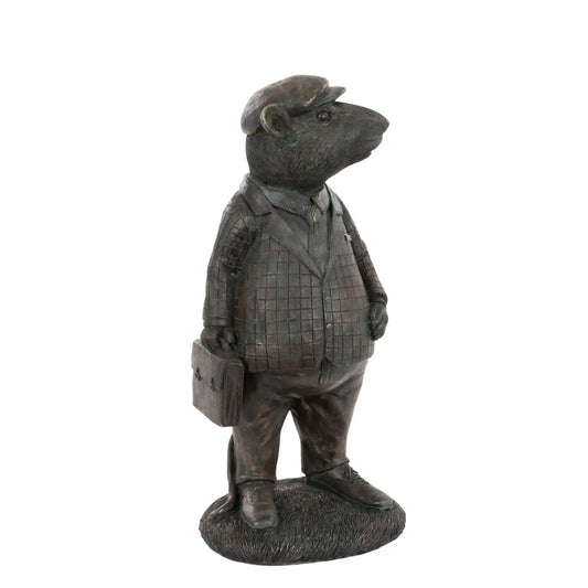 Statue of a bear in a suit and hat holding a briefcase on a white background