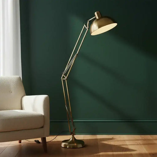 Gold floor lamp on a white background