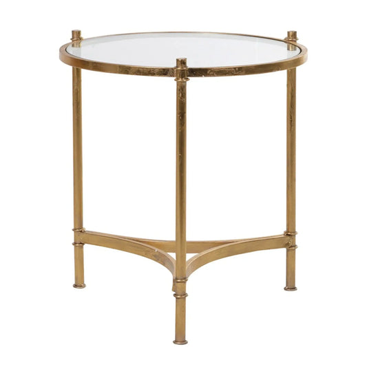 Round glass table with gold metal frame on a white background