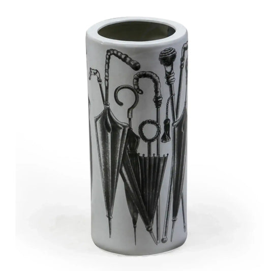 Cylindrical vase with black umbrella and cane design on a white background