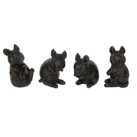 Four small bronze mouse figurines on a white background