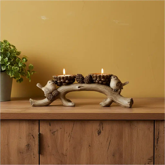 Decorative candle holder with candles on a wooden surface against a yellow wall.