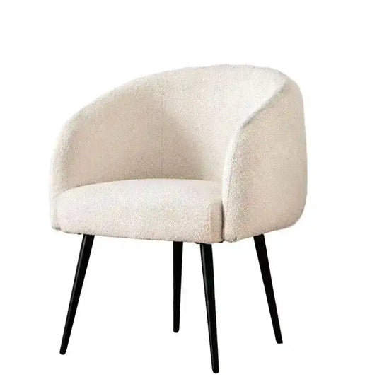 Beige armchair with black legs on a white background