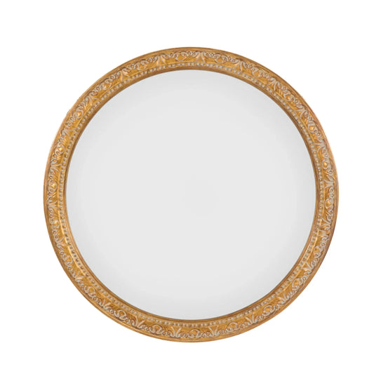 White plate with gold decorative rim on a white background