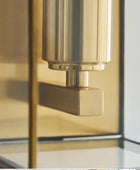 Gold door handle on a glass door