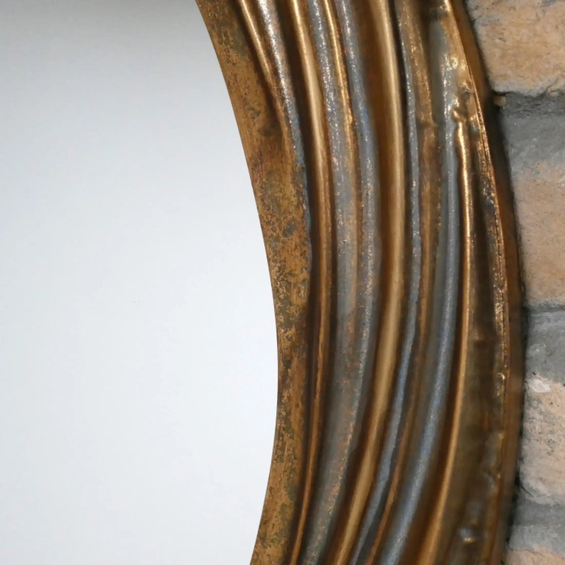 Close-up of a textured metal surface with a gradient background