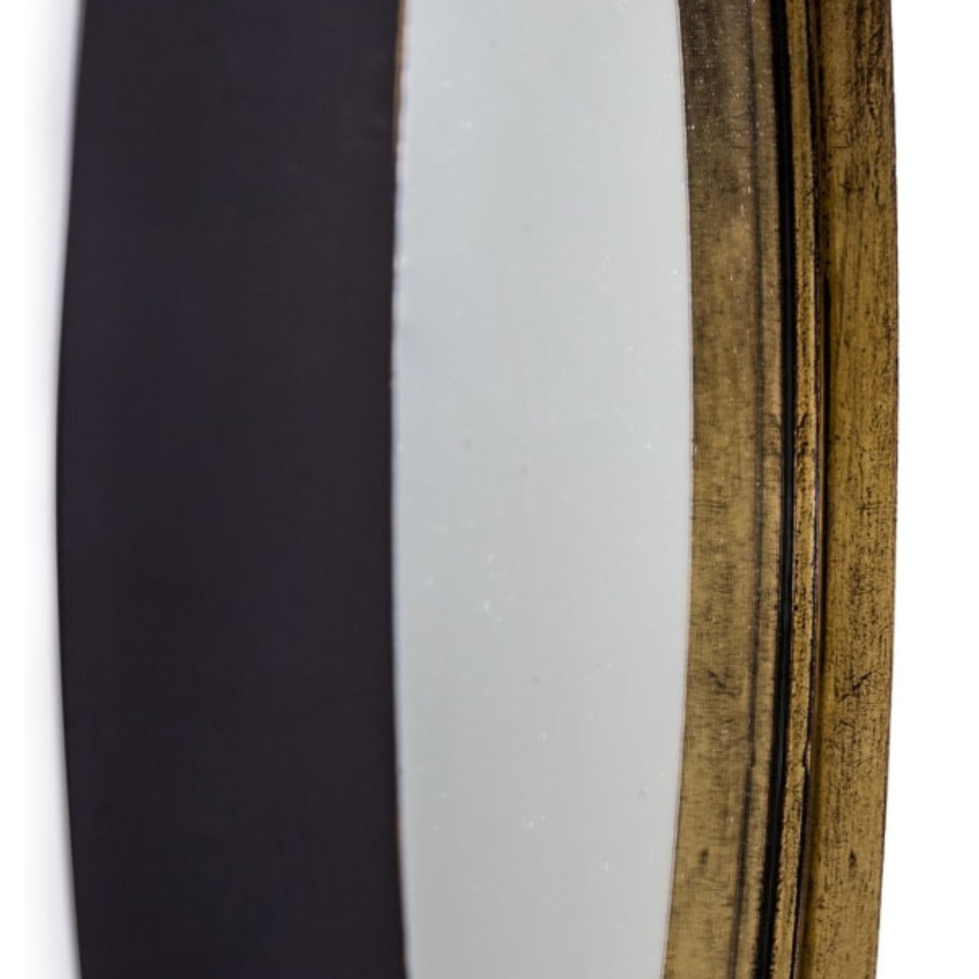 Two skis, one black and one brown with visible wear, on a white background