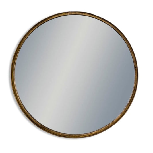 Round mirror with a gold frame on a white background