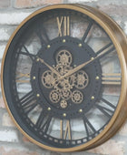 Decorative wall clock with mechanical design on a brick wall