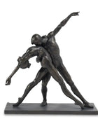 Bronze sculpture of two dancers in a dynamic pose on a white background