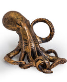 A bronze-finished octopus figurine with textured, weathered detailing, shown on a clean white background.