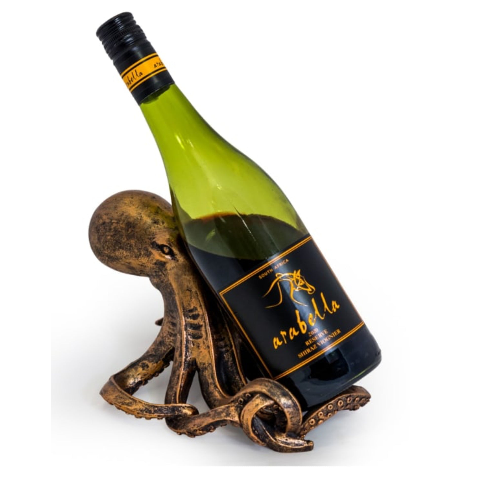 A green wine bottle with a black and gold Arabila label, displayed in a decorative bronze-colored octopus-shaped holder against a plain white background.