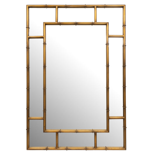 Gold-framed mirror with geometric design on a white background