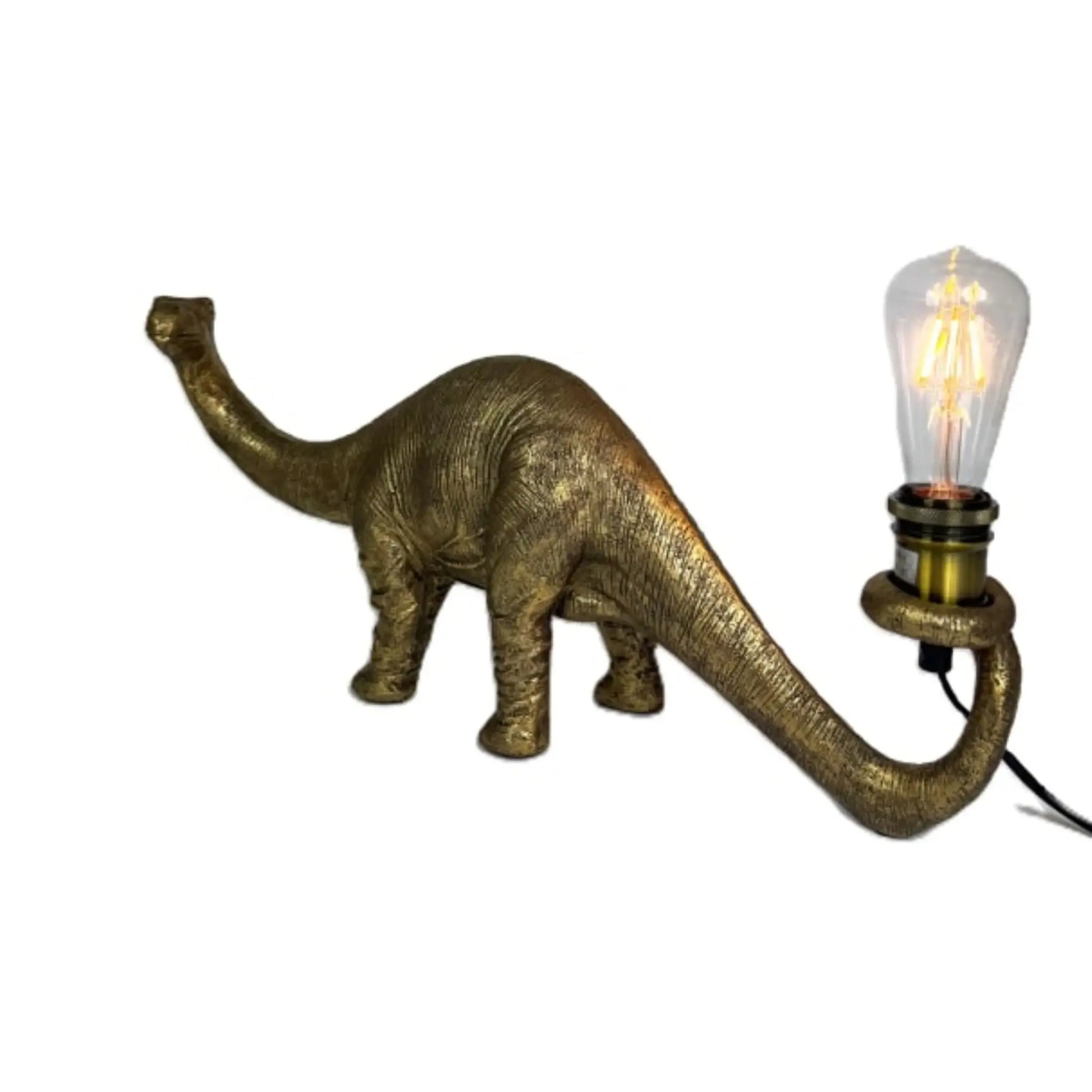 Dinosaur-shaped lamp with a lit bulb on a white background