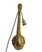 Decorative wall lamp with textured gold base and black cord on a white background