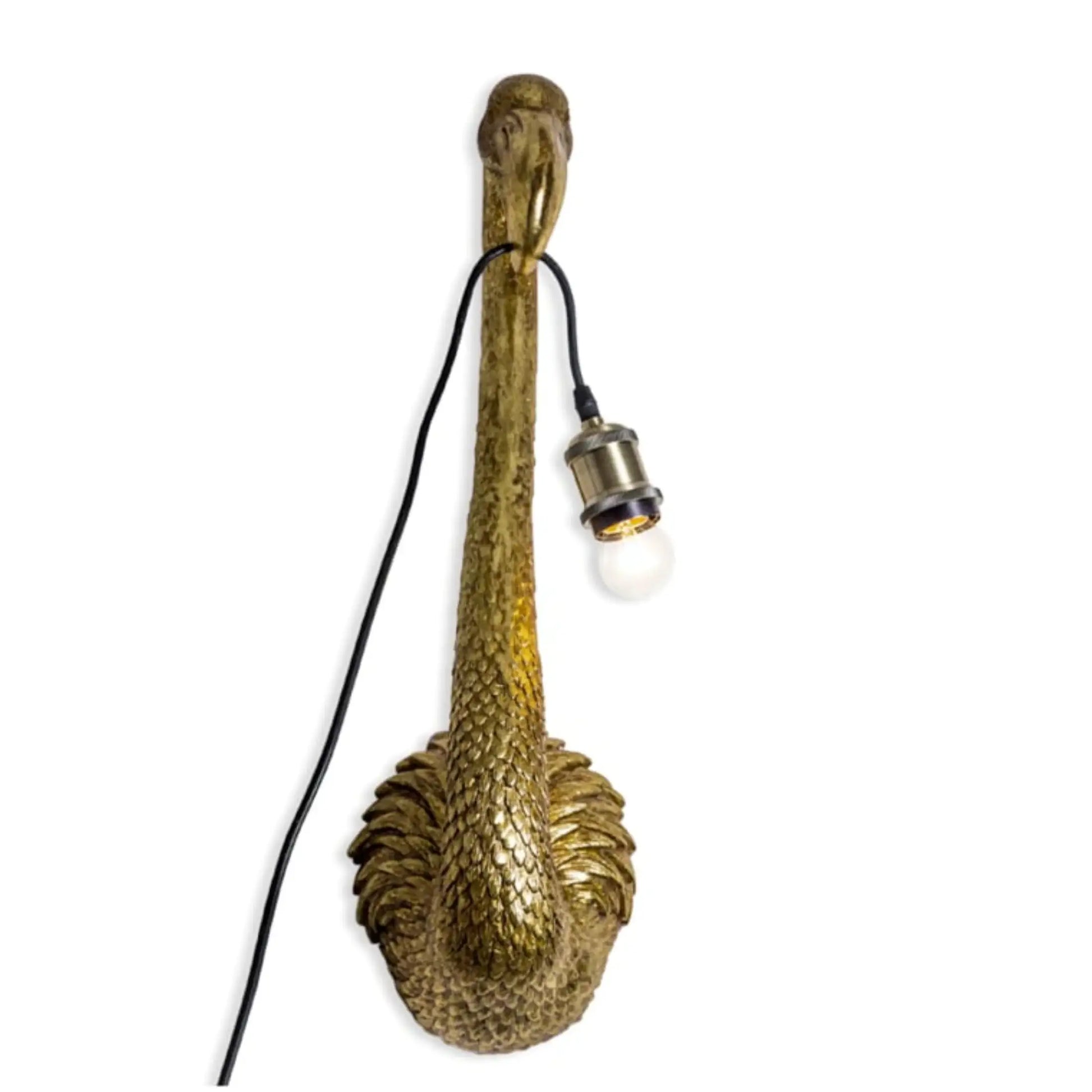 Decorative wall lamp with textured gold base and black cord on a white background