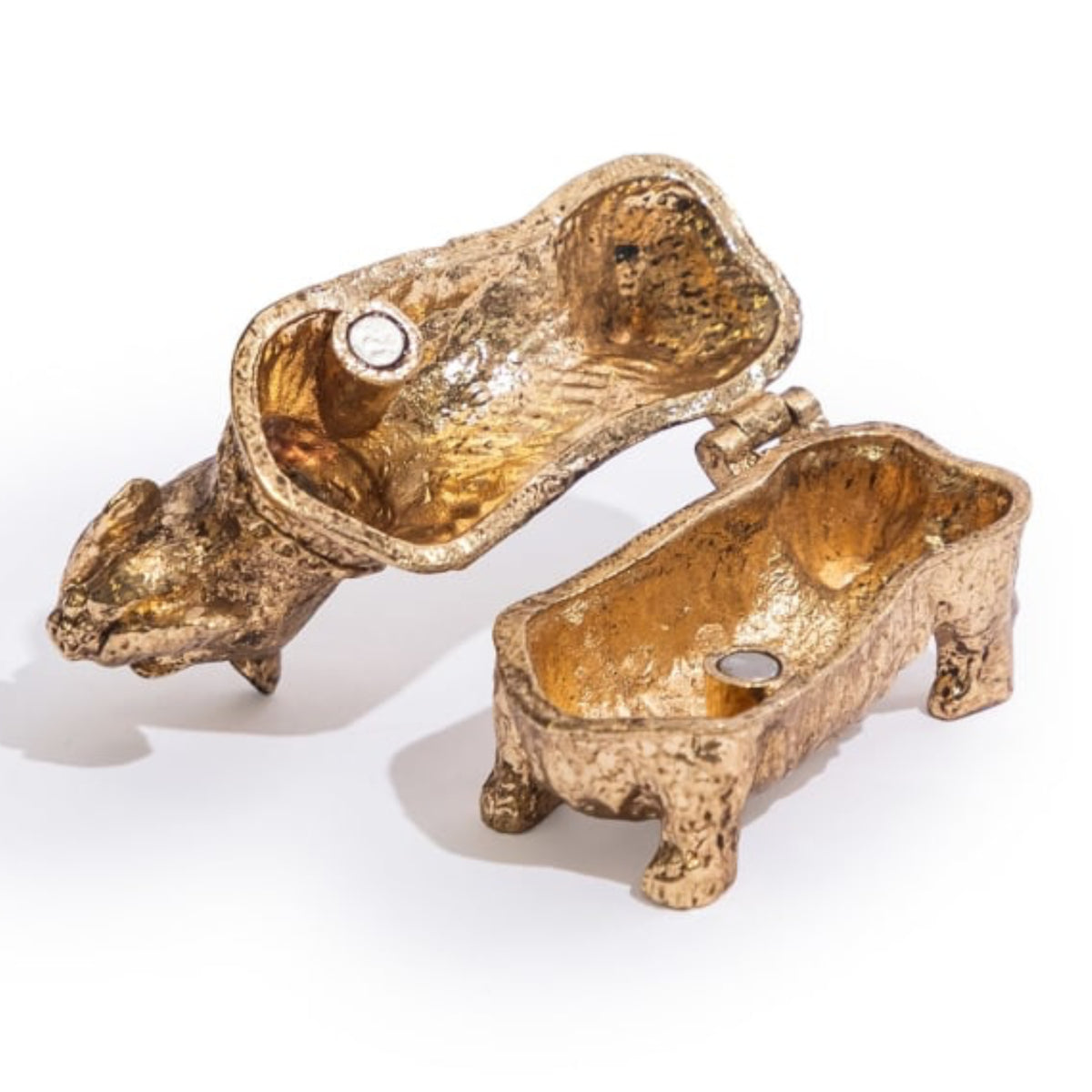 A pair of gold-toned animal-shaped candle holders shaped like a mouse and a pig, shown open on a white background.
