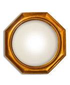 Gold octagonal mirror on a white background