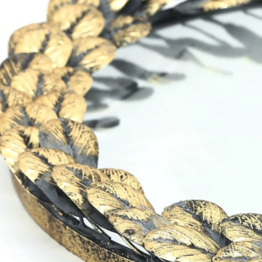 Close-up of braided gold and black cord on a white background