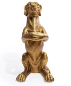 Bronze statue of a dog with arms crossed on a white background