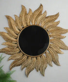 Decorative wall mirror with sunflower design on a plain background