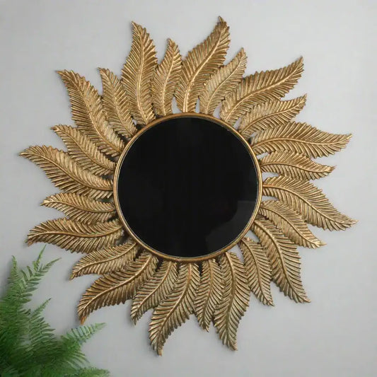 Decorative wall mirror with sunflower design on a plain background