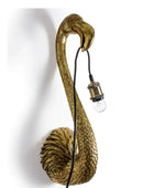 Gold flamingo-shaped wall lamp with a bulb on a white background
