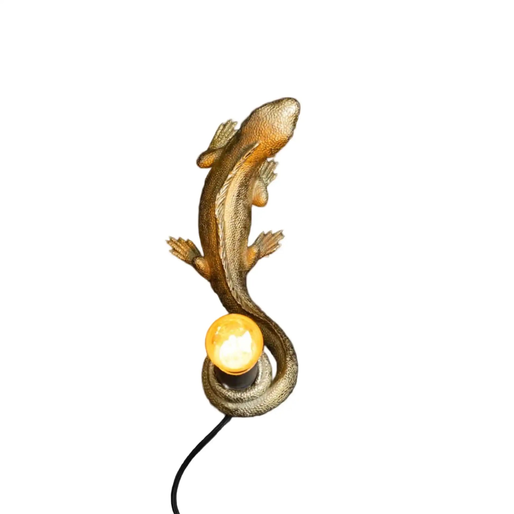 Lizard-shaped lamp with a light bulb on a white background