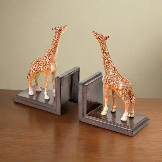 Giraffe bookends on a white background