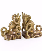 Pair of decorative octopus bookends on a white background