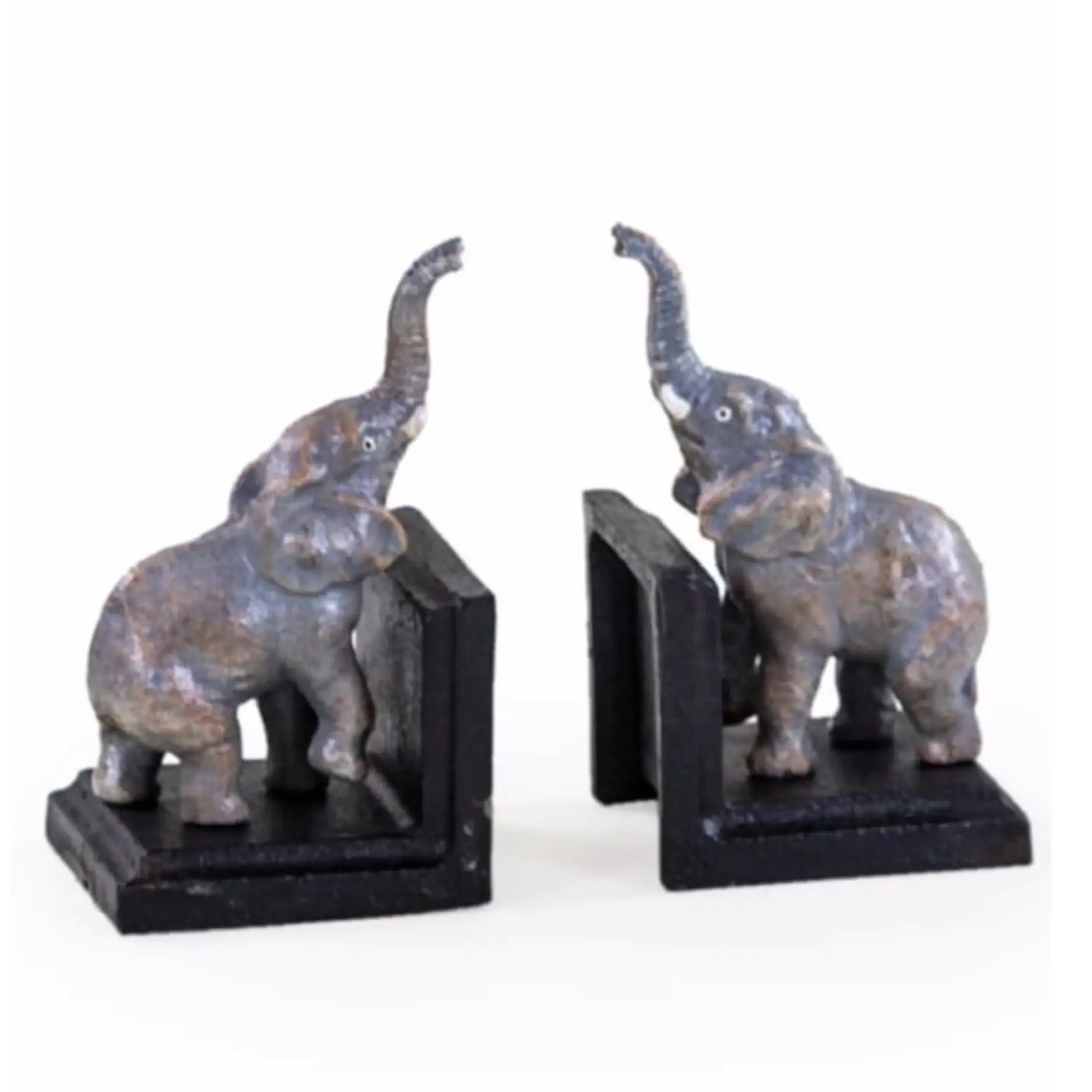 Two elephant bookends on a white background