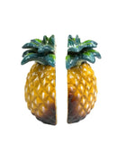 Pineapple-shaped earrings on a white background