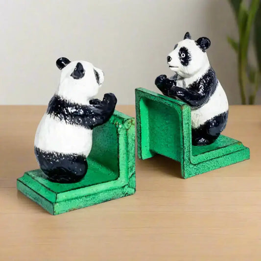 Two panda bookends on a white background
