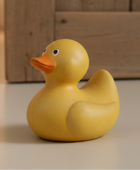 Yellow rubber duck on a neutral background