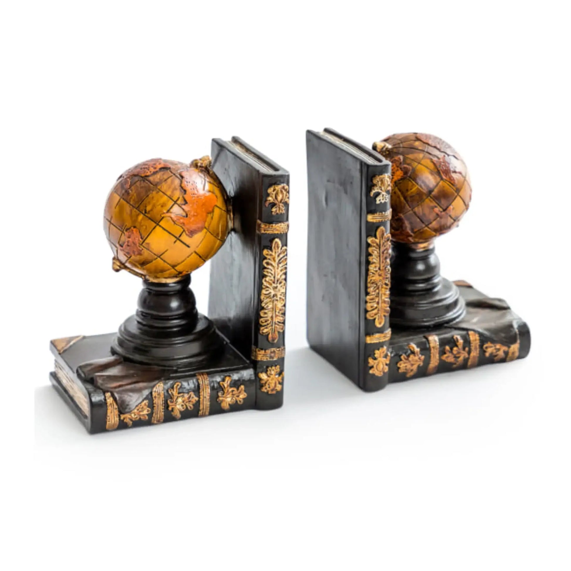 Pair of decorative bookends with globe design on a white background