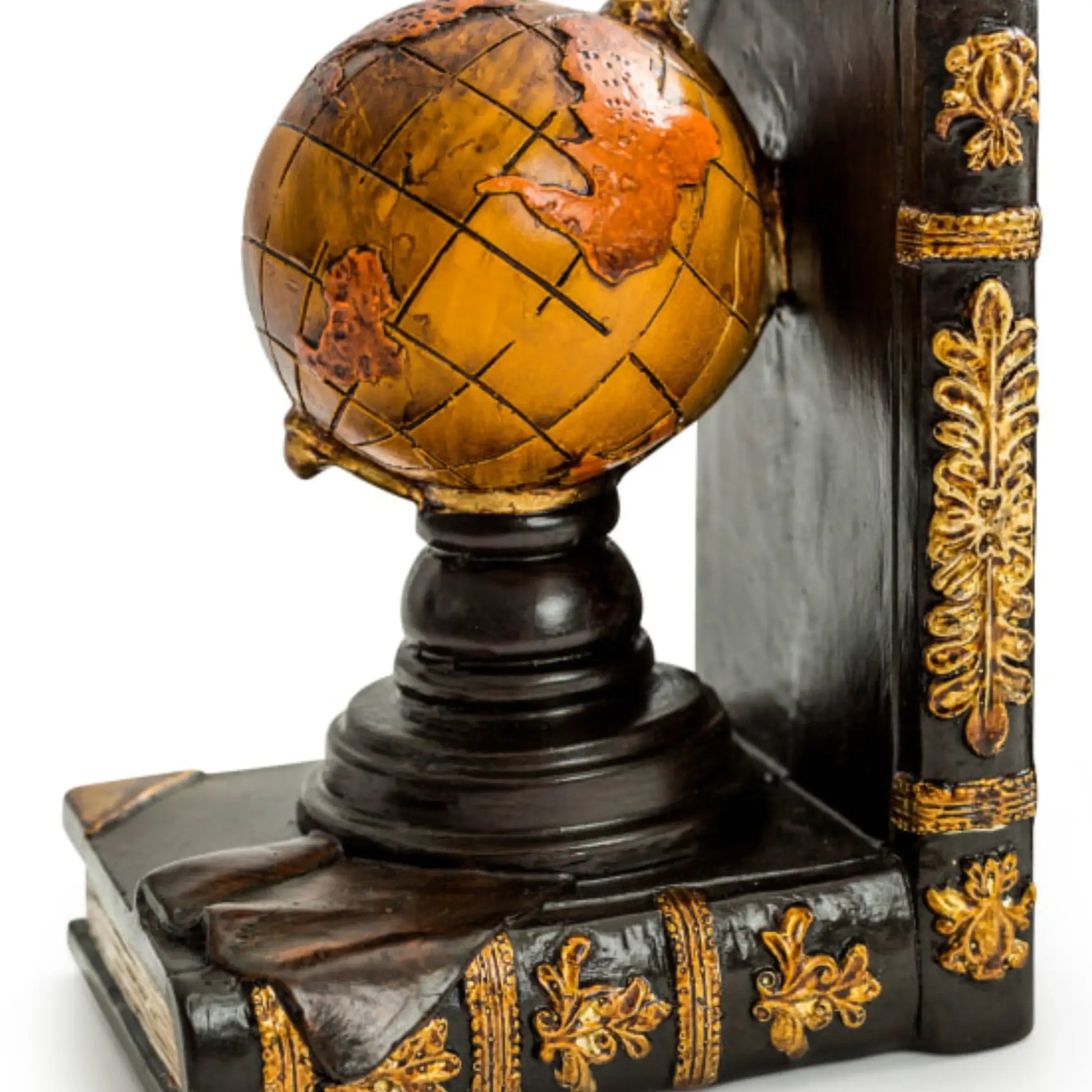 Decorative bookend with globe on top against a white background