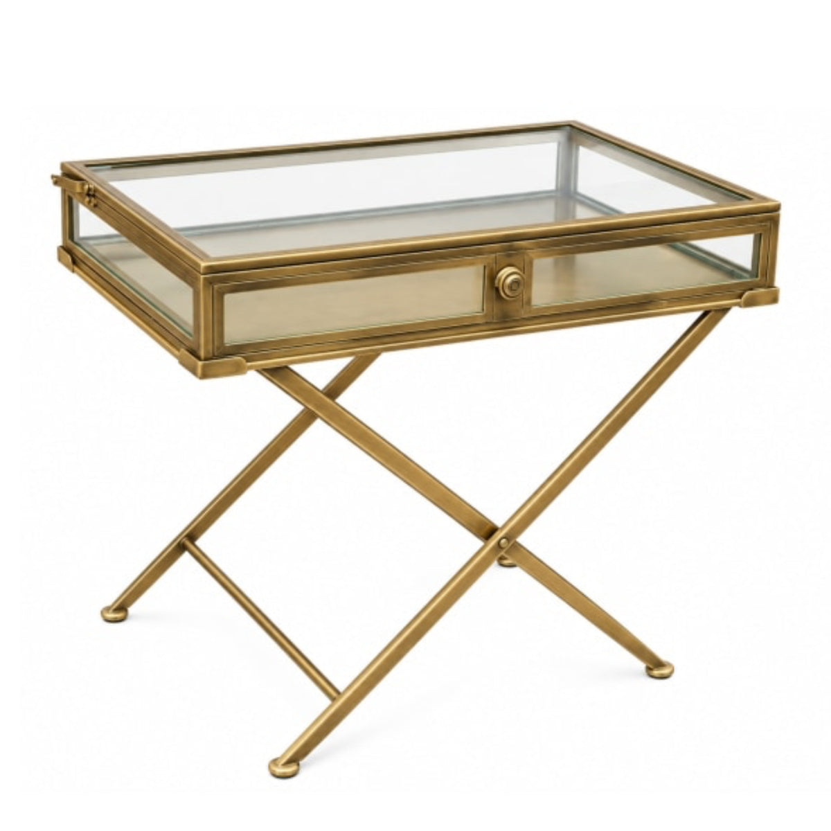 A gold-finished metal side table with a glass top, a single drawer with a glass front and round gold knob, and an X-shaped folding base, shown on a white background.