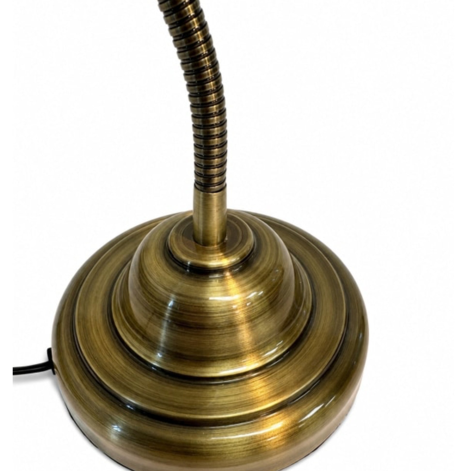 A vintage-style desk lamp with a wide, tiered circular base and a flexible coiled neck, finished in a polished antique brass or bronze metal, shown against a plain white background.