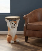 Table designed like a bulldog in a living room setting with a brown sofa and window.
